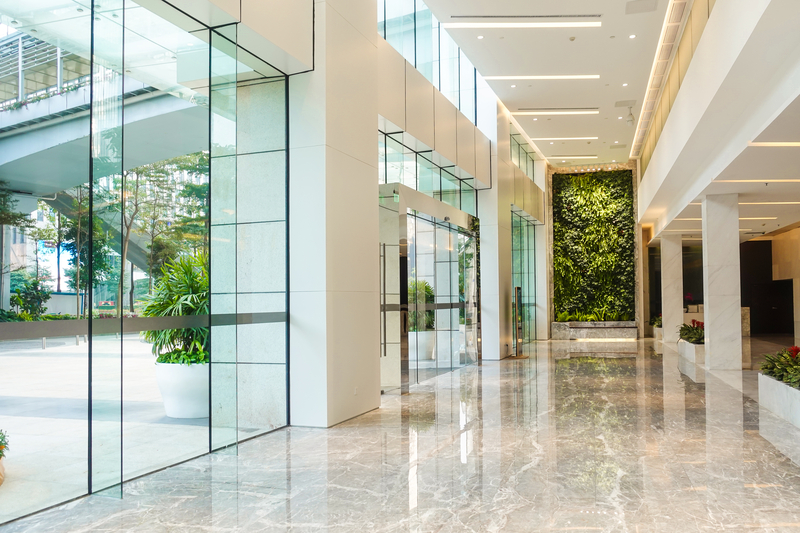 Modern hotel reception with tall windows